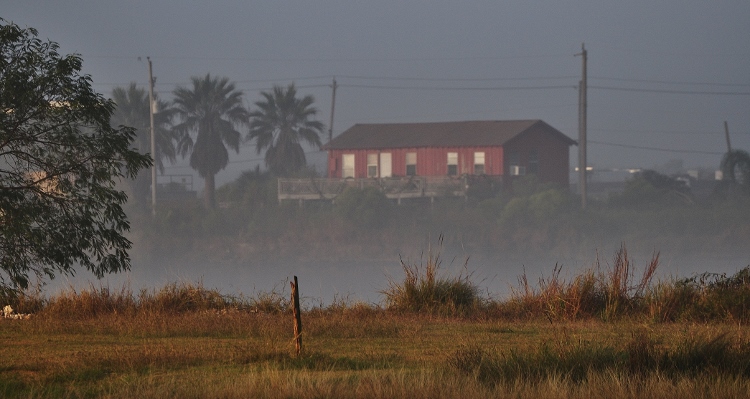 red house on water